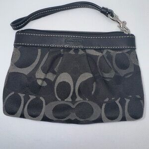 Coach Black Clutch with Monogram Pattern and Leather Trim